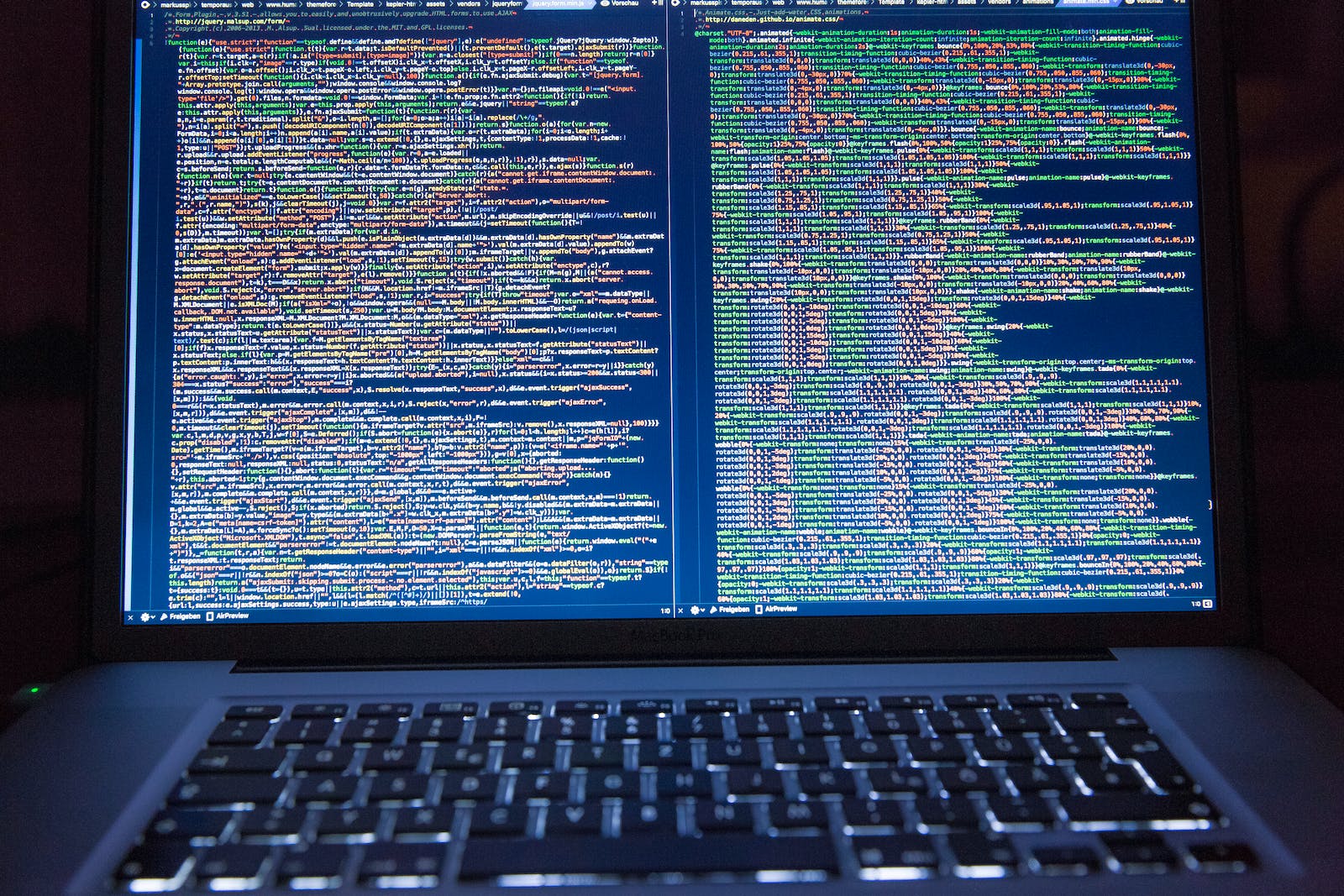 programming-background-with-person-working-with-codes-computer_23-2150010133 (1).jpeg